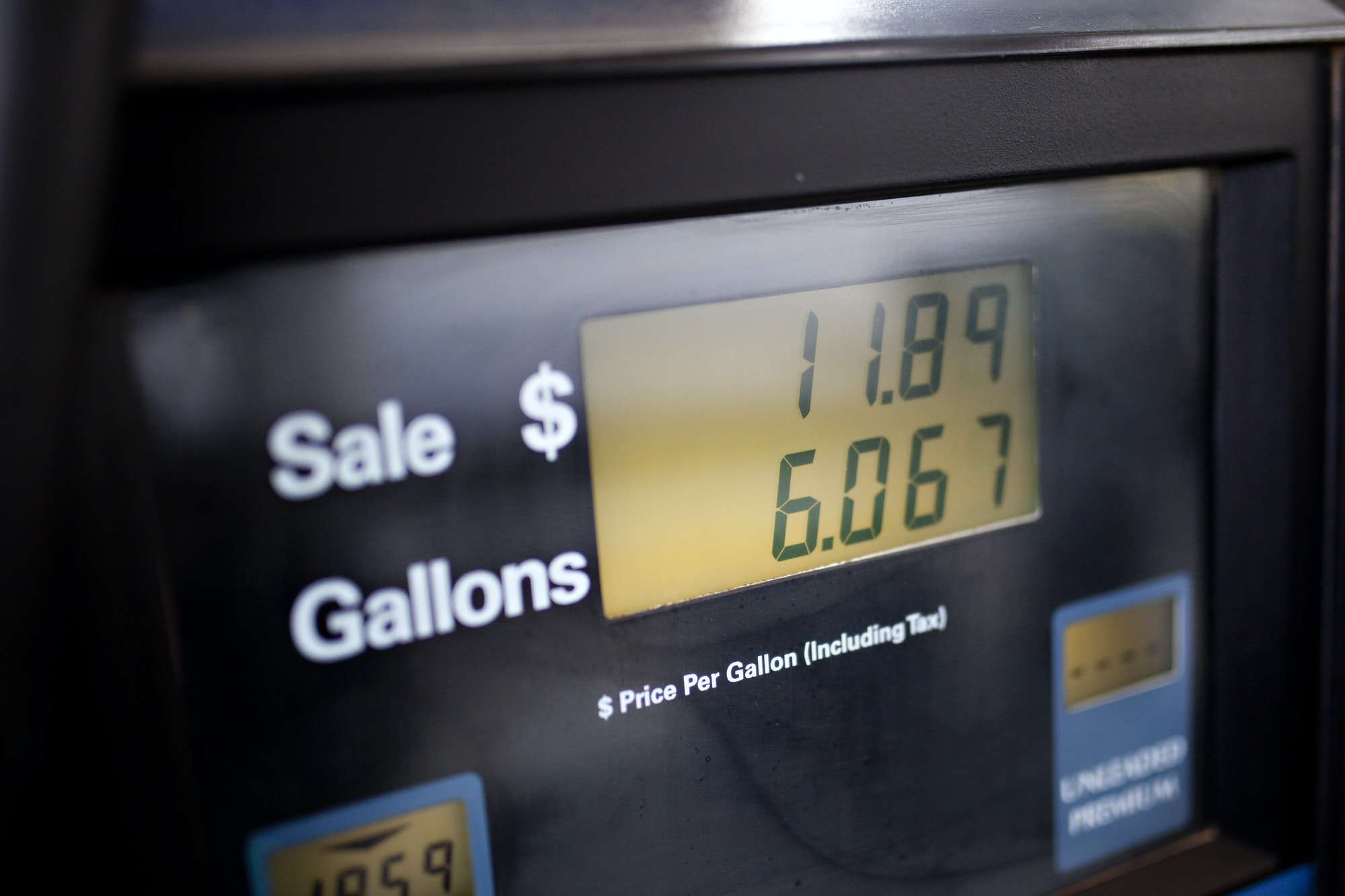 Filling up a car with gasoline at the pump